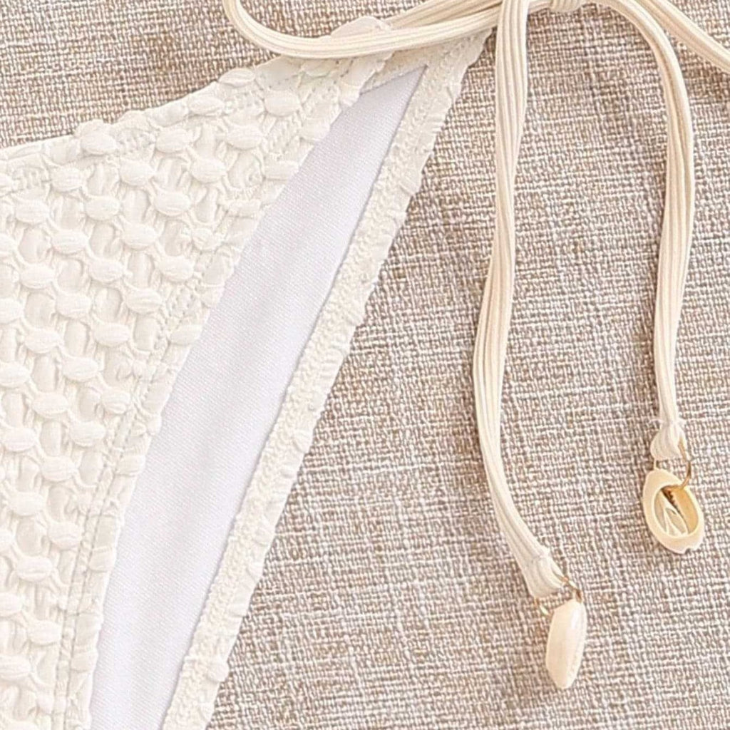 Hanging neck and tie up split swimsuit