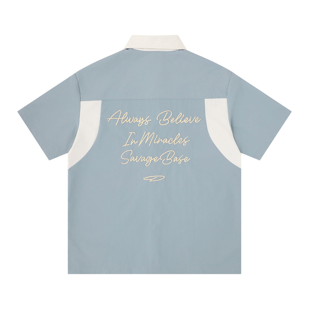 Embroidered letters contrasting colors short sleeves