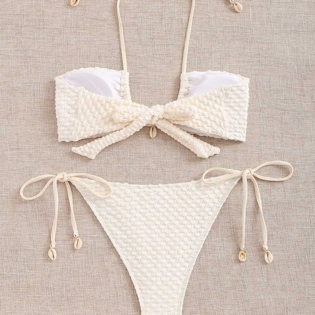 Hanging neck and tie up split swimsuit