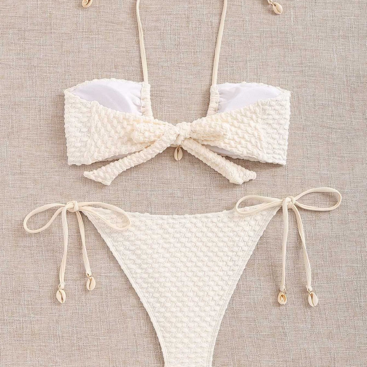 Hanging neck and tie up split swimsuit