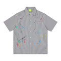 T-shirt brodé taches d'encre et points de couleur